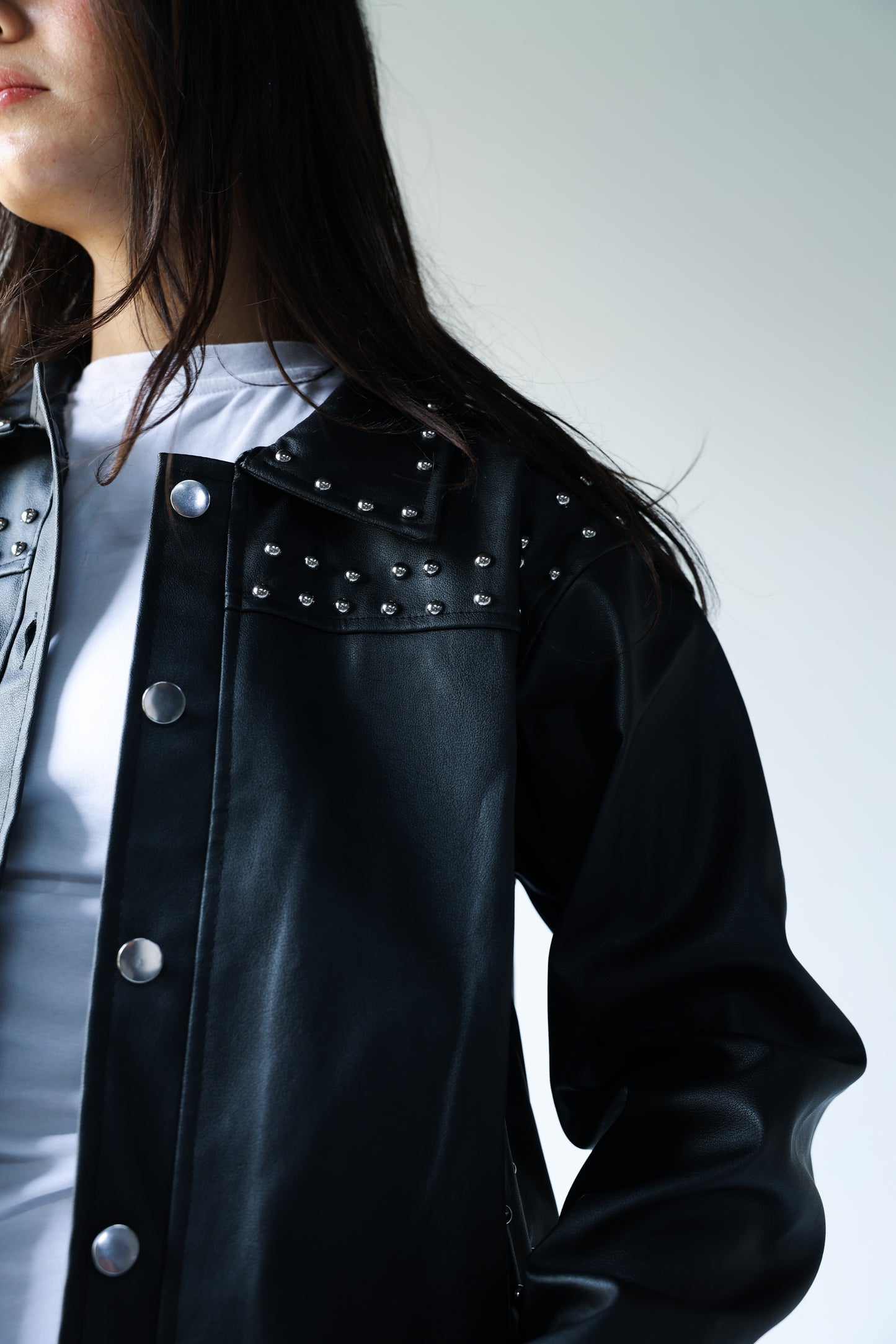 Black leather jacket with silver studs
