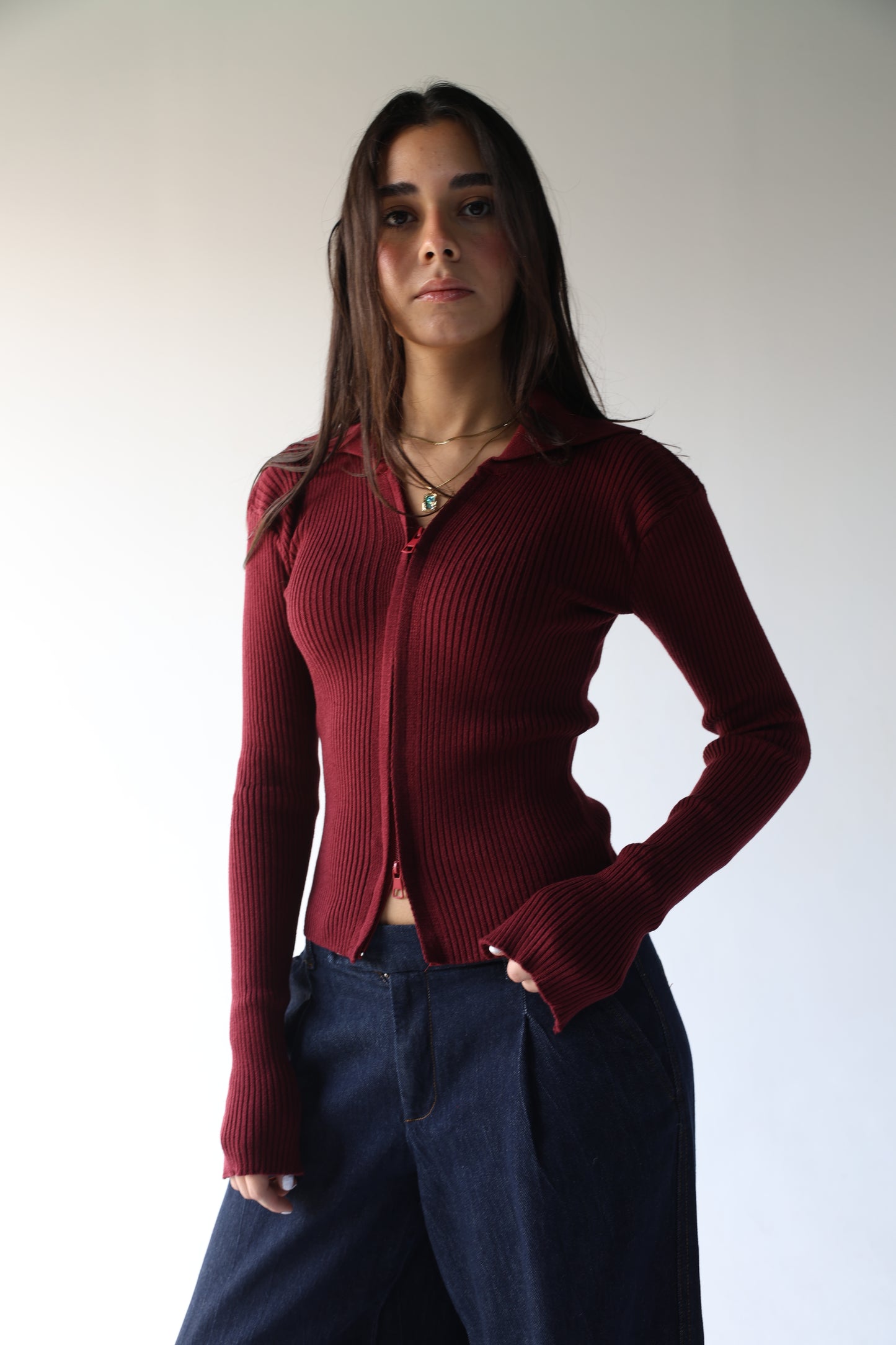 Burgundy knit pullover with zippers
