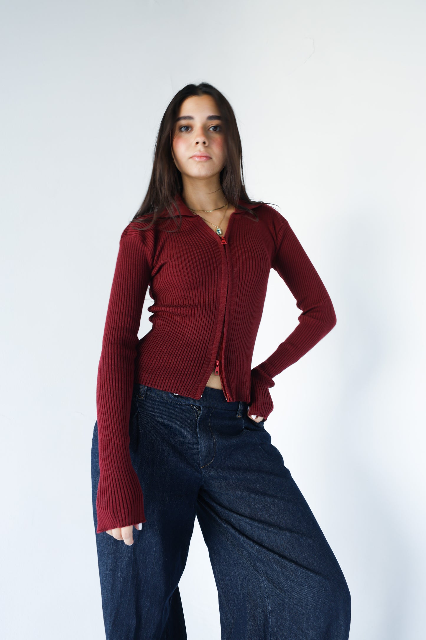 Burgundy knit pullover with zippers