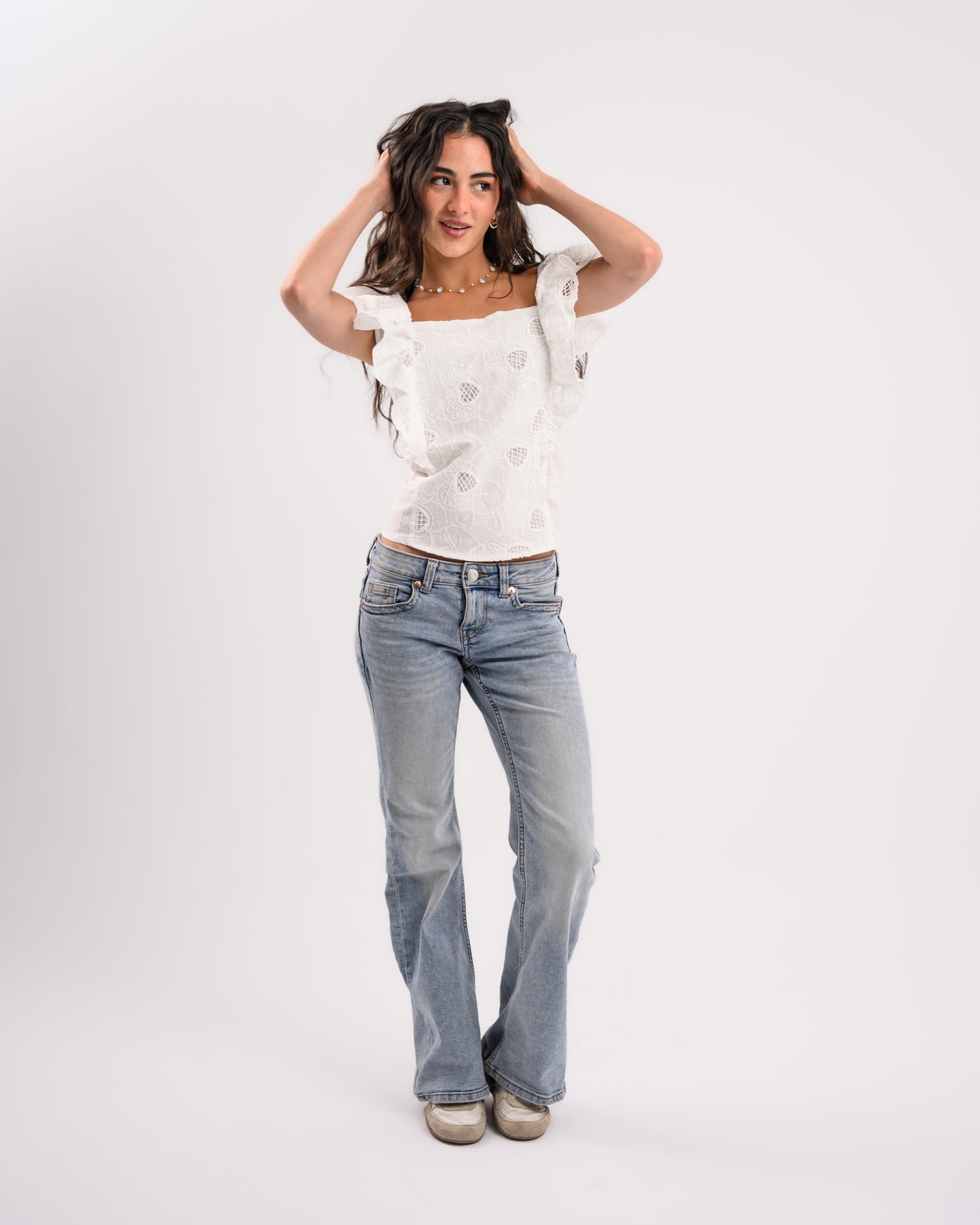 White Top With Shoulder Ruffles