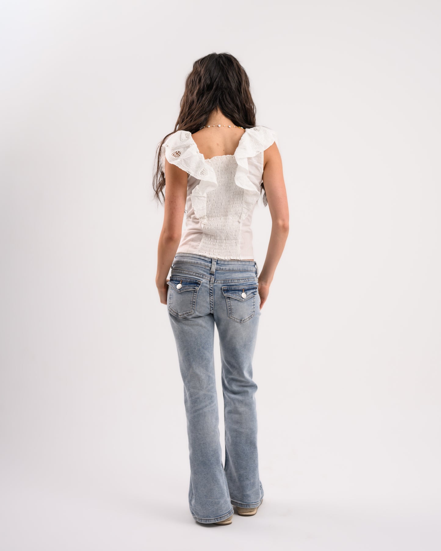 White Top With Shoulder Ruffles
